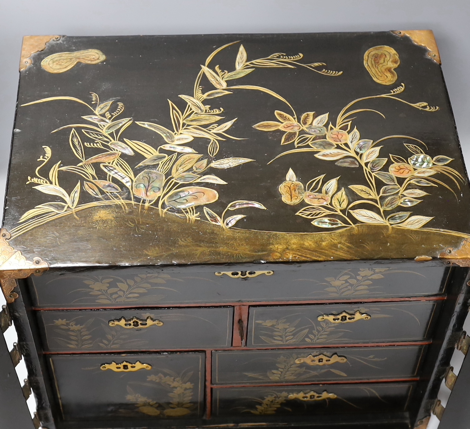 A 19th century Japanese lacquer table cabinet, 44cm wide